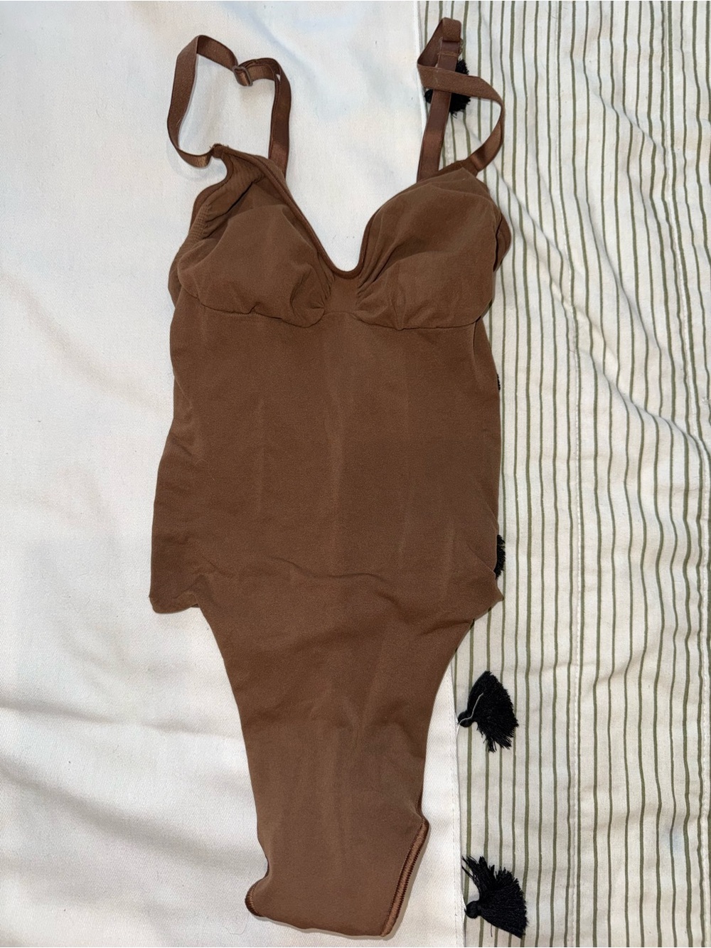 SKIMS deep plunge low-back thong bodysuit in Cocoa